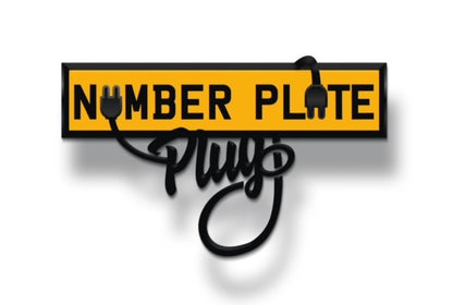Metallic 'Number Plate Plug' sign with yellow background and black text on a white background