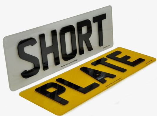 Two license plates with 'SHORT PLATE' text on a white background